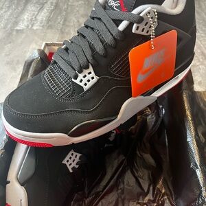 Nike Air Jordan 4: Black and Red Sneakers